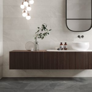 An ultra contemporary bathroom with floating vanity featuring shale collection tile from Italgraniti